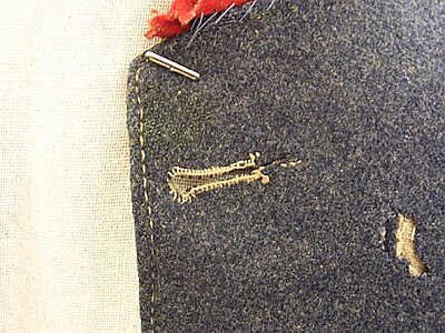 Click image for larger version

Name:	Buttonhole9.jpg
Views:	584
Size:	47.3 KB
ID:	217047