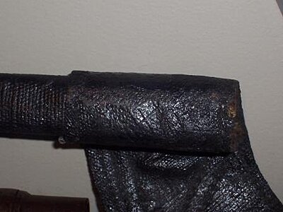 Click image for larger version

Name:	Scabbard3.jpg
Views:	199
Size:	19.0 KB
ID:	217052