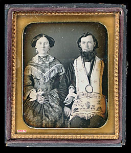 Click image for larger version

Name:	Man with beard, dressed in Odd Fellows apron and wife.jpg
Views:	111
Size:	32.7 KB
ID:	228524