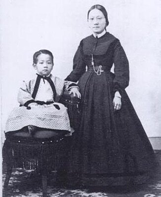 Click image for larger version

Name:	Asian Woman and son.jpg
Views:	342
Size:	20.4 KB
ID:	228530